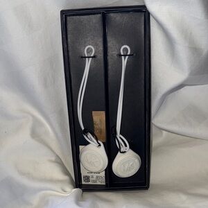 NWT Michael Kors - the tag says for (2) air tag covers,however……